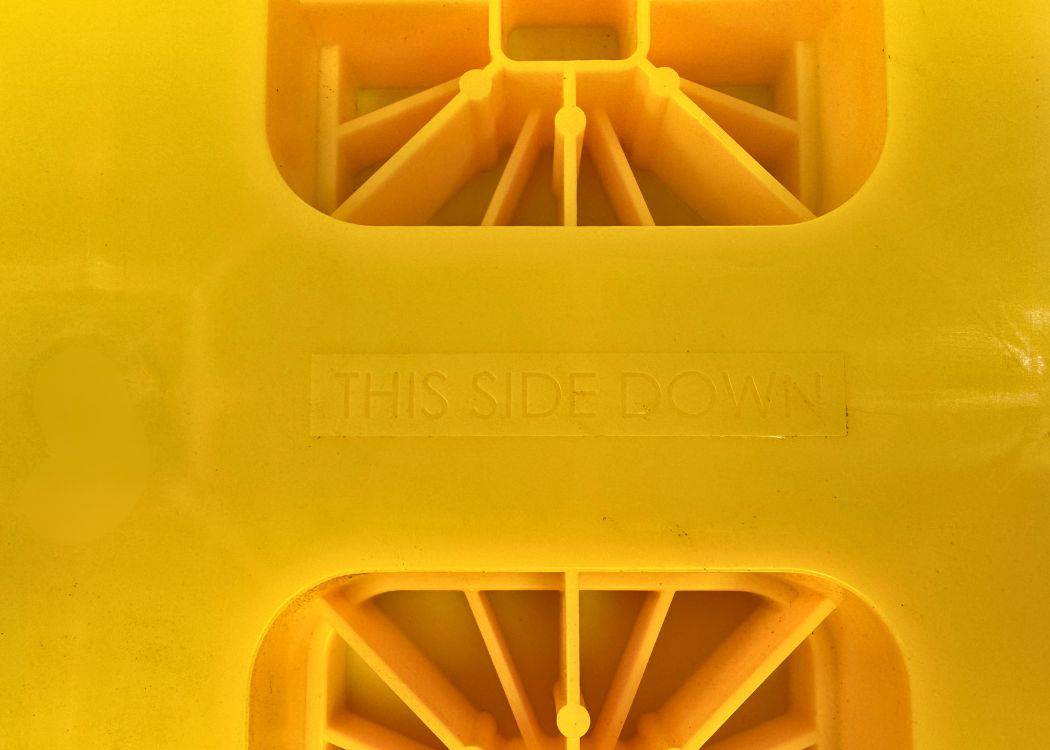 Yellow Levelling Blocks showing This Side Down