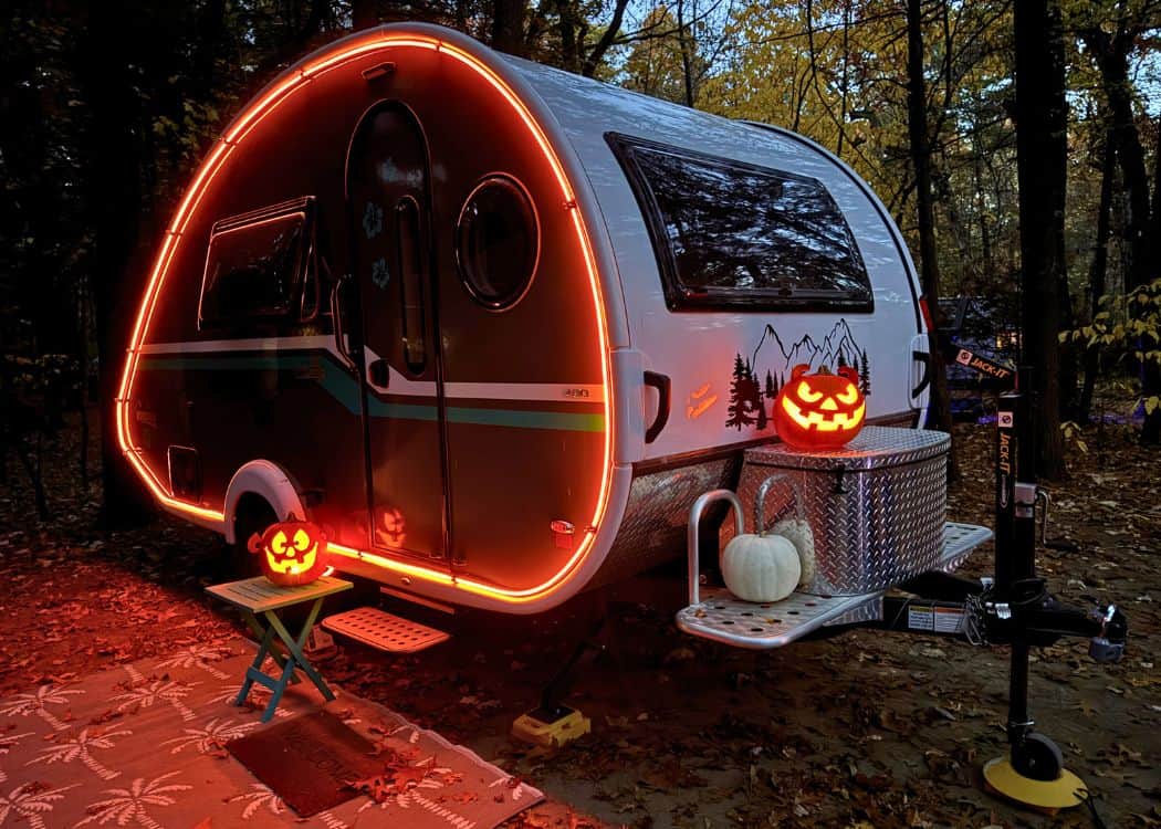 Turkey Point Provincial Park - Nellie in orange neon with two carved pumpkins