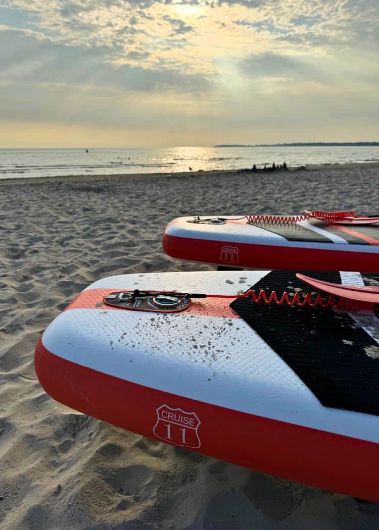 Sandbanks Provincial Park - Paddleboards sitting on the beach in the early evening