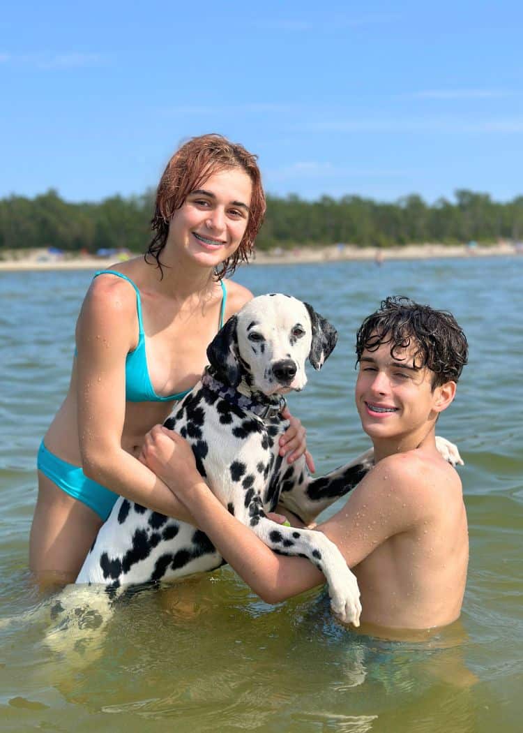 Sandbanks Provincial Park - The kids and Guinness in the water at the beach