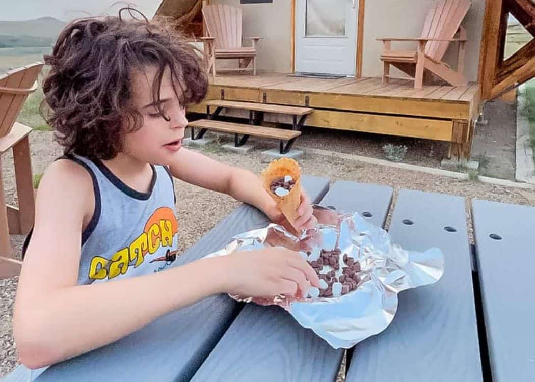 Boy Making Smores at Campsite