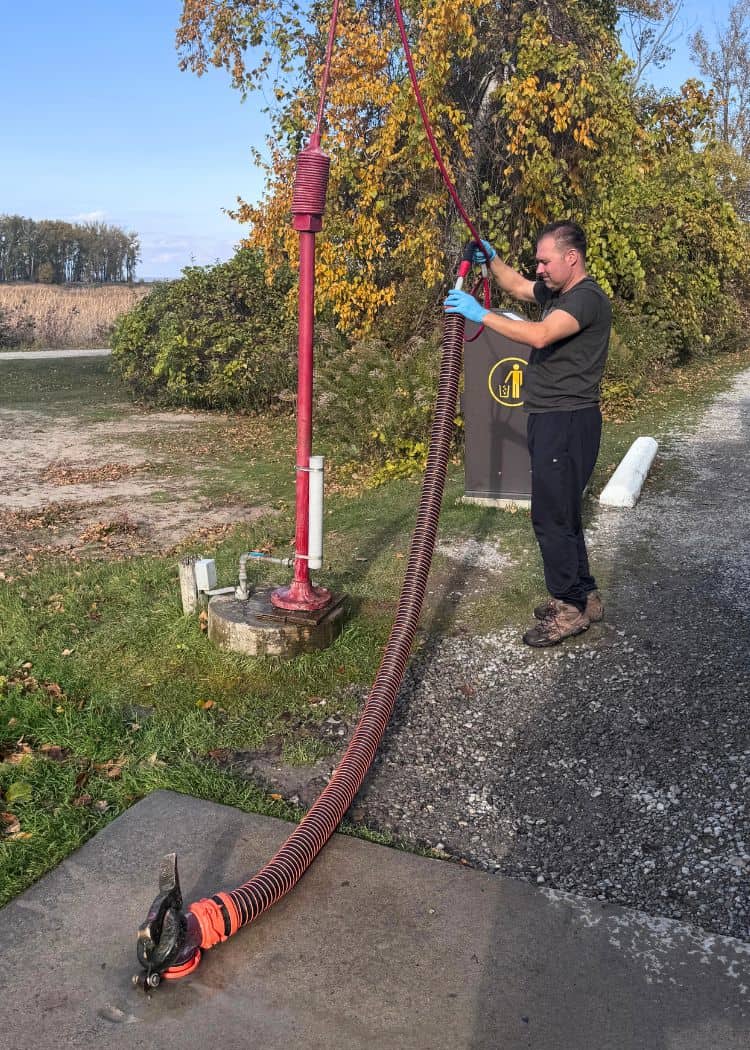 Dump Station - John rinsing out stinky slinky
