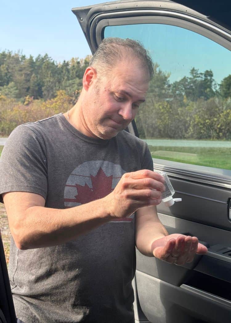 Dump Station - John sanitizing his hands