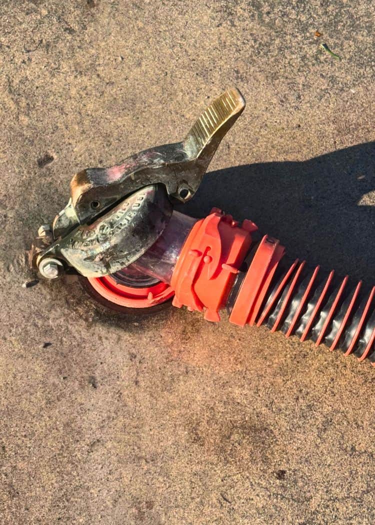 Dump Station - Our hose plugged into the dump station hole