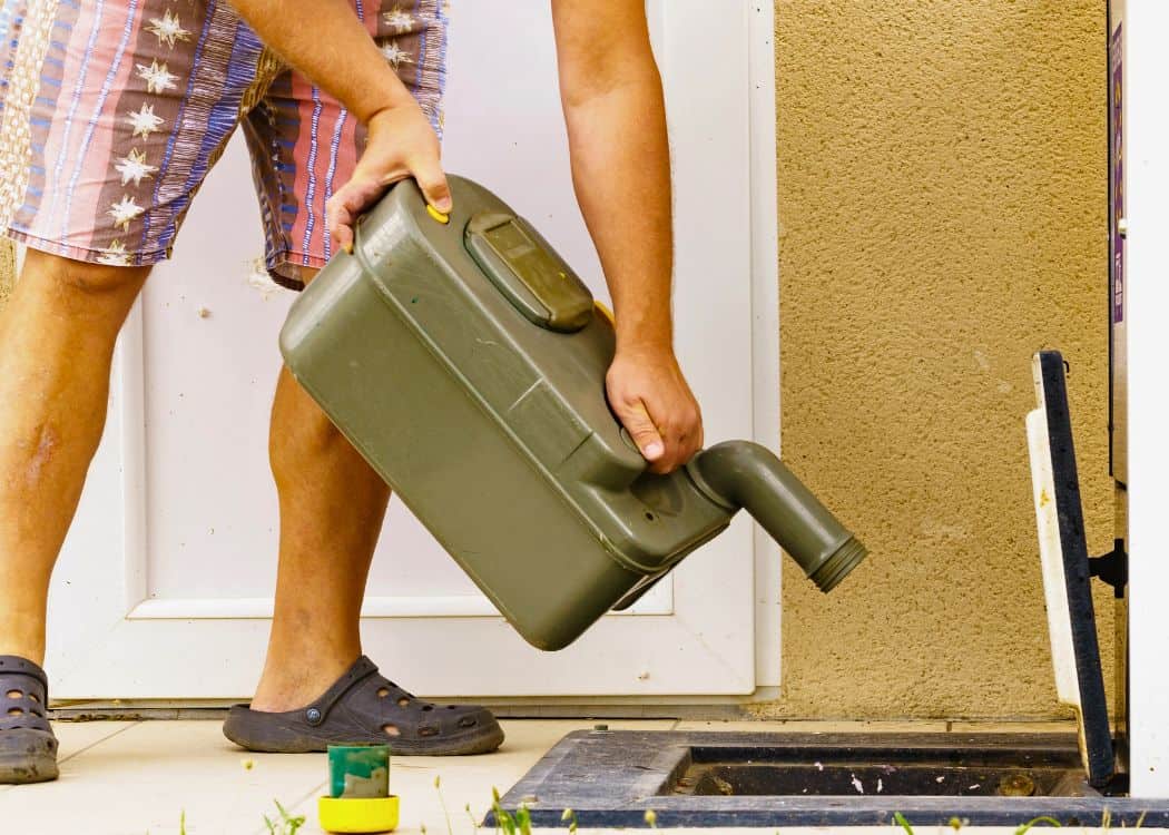 Dump Station - Person emptying Casette Toilet at dump station