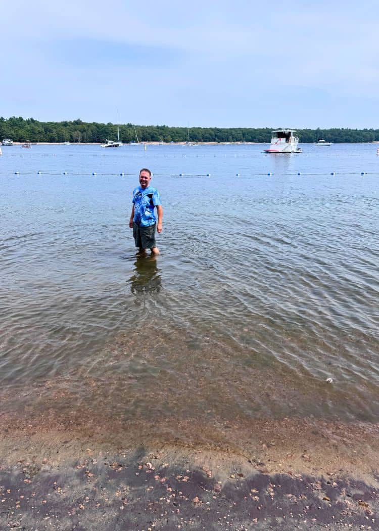 Killbear Provincial Park - John wading at the beach at the day use area