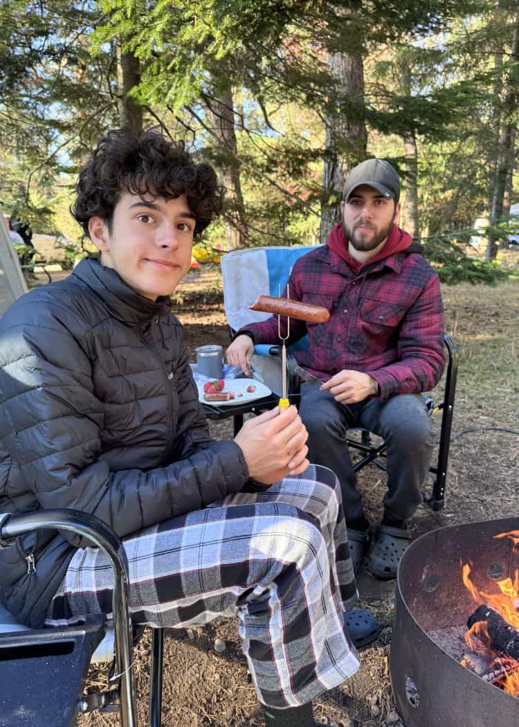 What We Eat While Camping - Kids eating hot dogs
