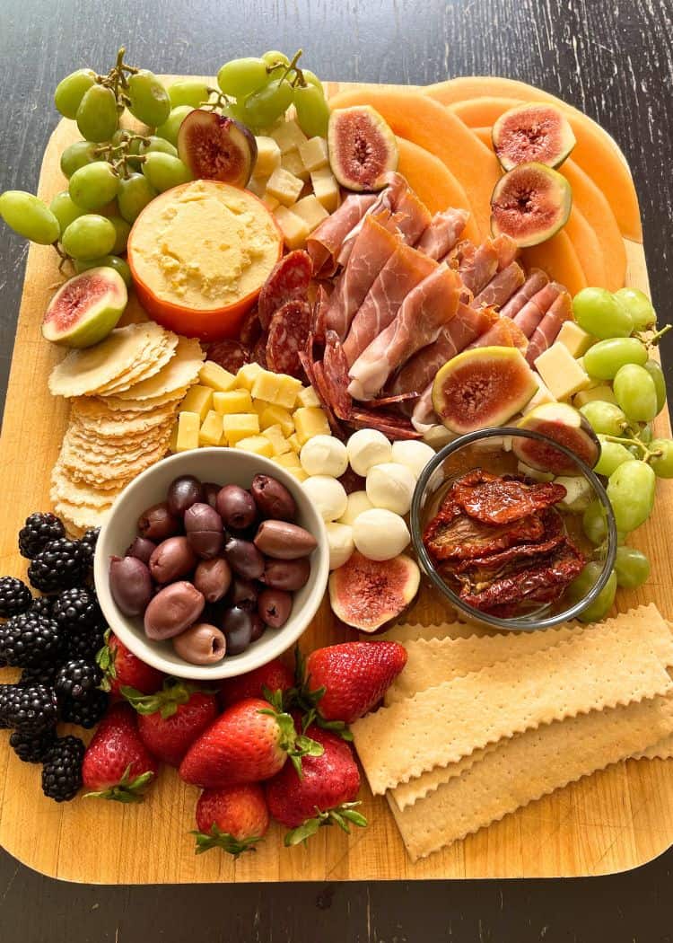 What We Eat While Camping - Large charcuterie board for the whole gang
