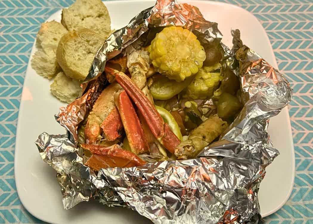 What We Eat While Camping - Seafood Foil pack on a plate