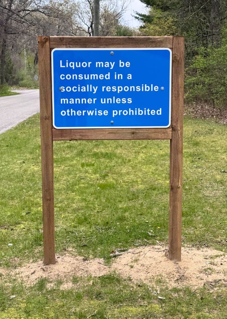 Liquor sign in park